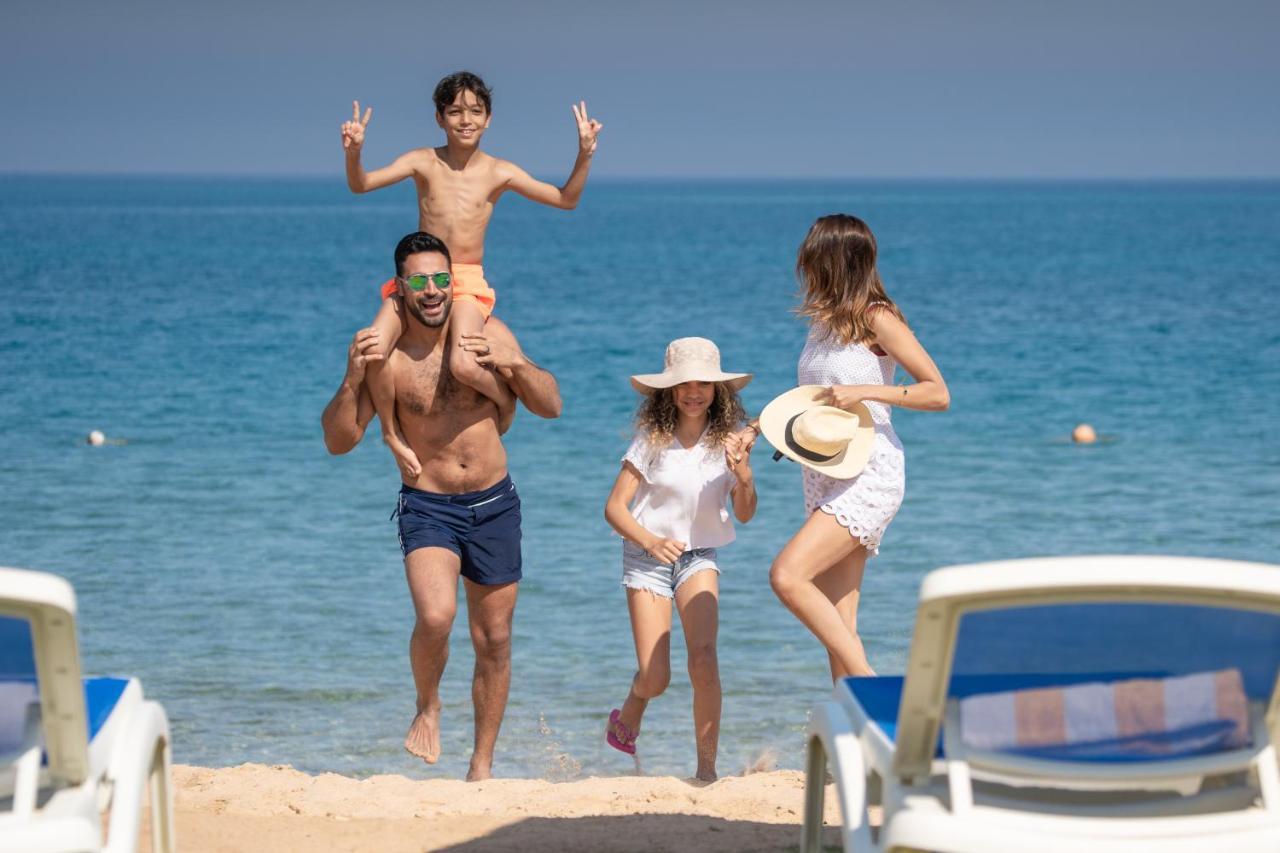 Grand Ocean El Sokhna Hotel Ain Sukhna Exterior foto Family on a beach