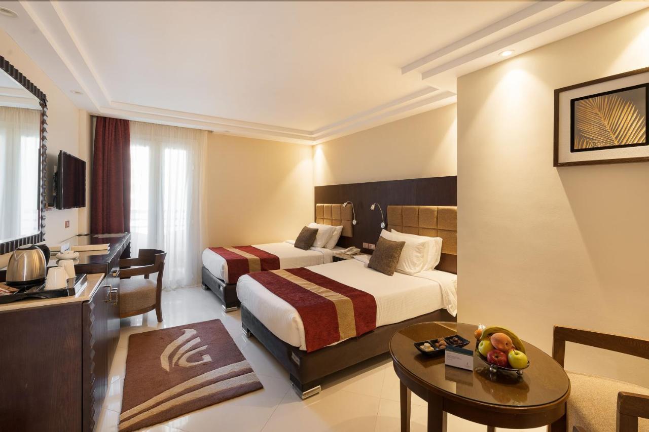Grand Ocean El Sokhna Hotel Ain Sukhna Exterior foto A room at the hotel